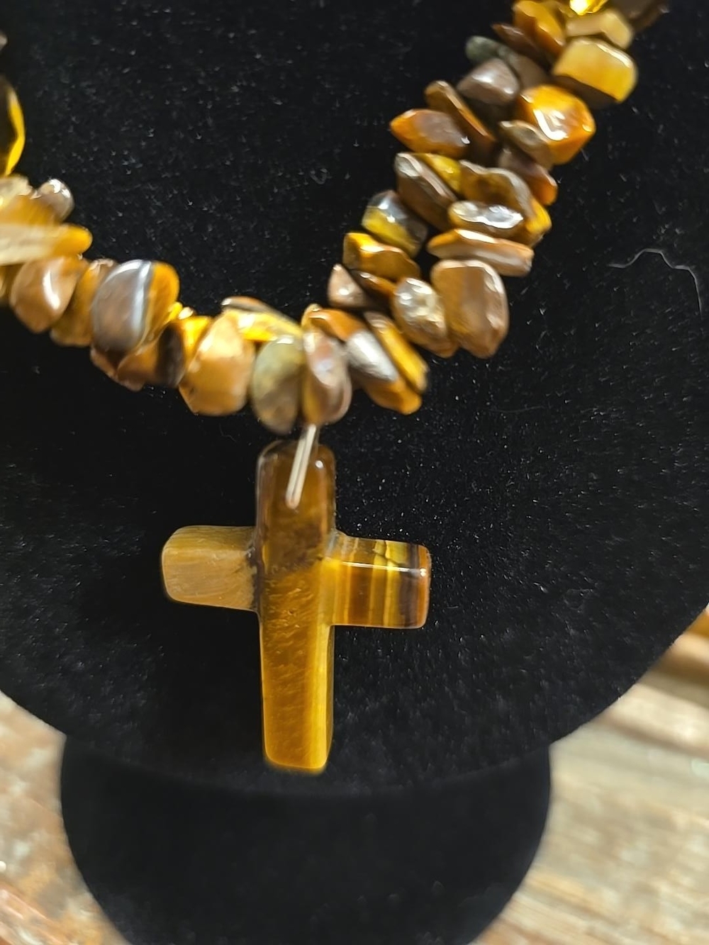 Tiger’s Eye chip-bead necklace with a Tiger’s Eye cross pendant.